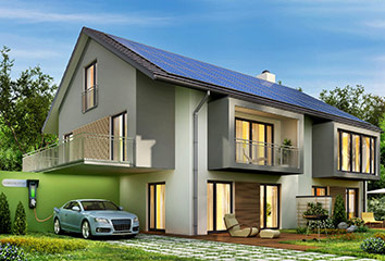Haus mit Photovoltaik und Ladestation für E-Autos